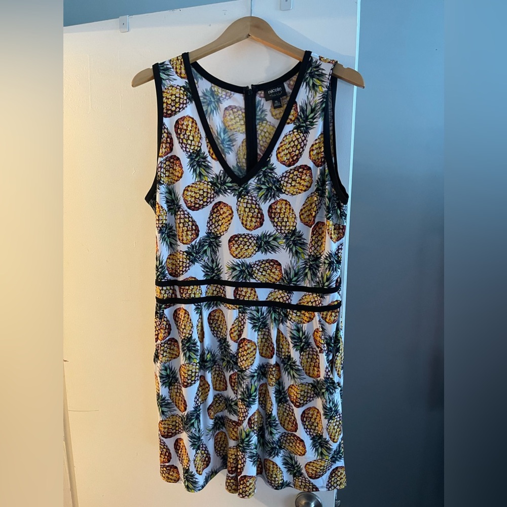 XL | Pineapple Romper. 95% Polyester 5% Spandex.